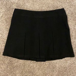 Women’s black pleated skirt
